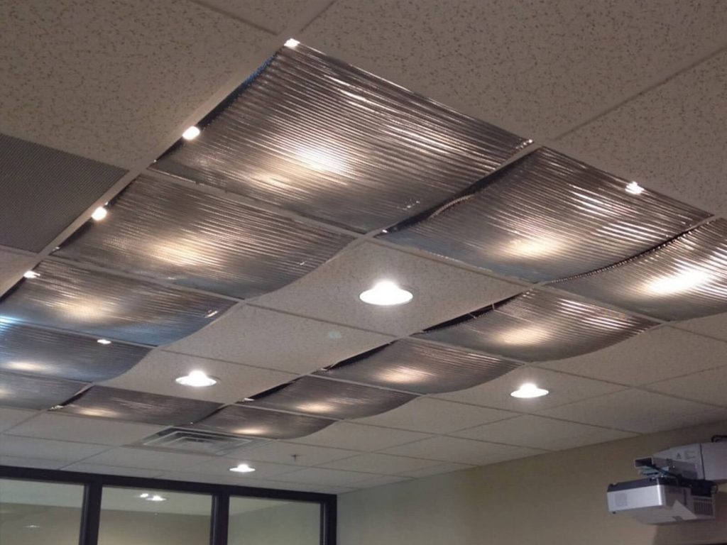 It is a false ceiling made of mineral fibers.
