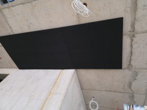 Isolation collé contre la dalle