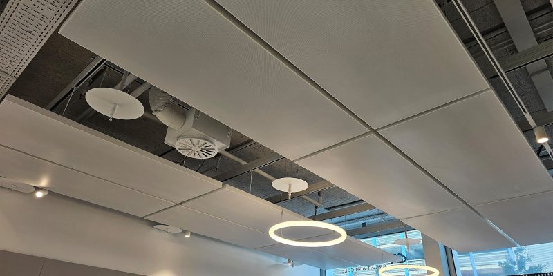 A well-lit false ceiling installed in an office